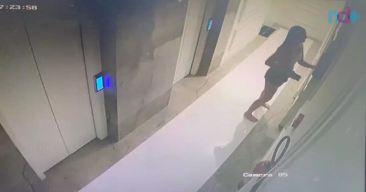 Imagens das câmeras de monitoramento do prédio registraram momento em que mulher coloca celulares na caixa de hidrante – Foto: Reprodução/ND